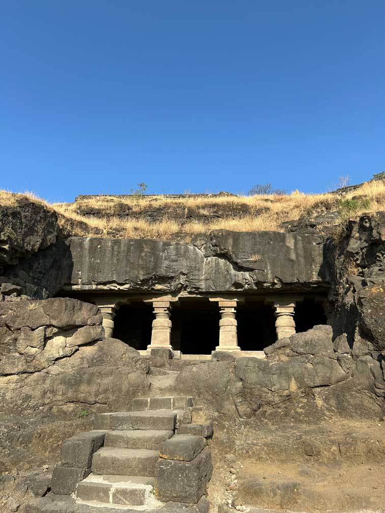 Ancient wall carvings depicting Buddhist scenes at Ellora