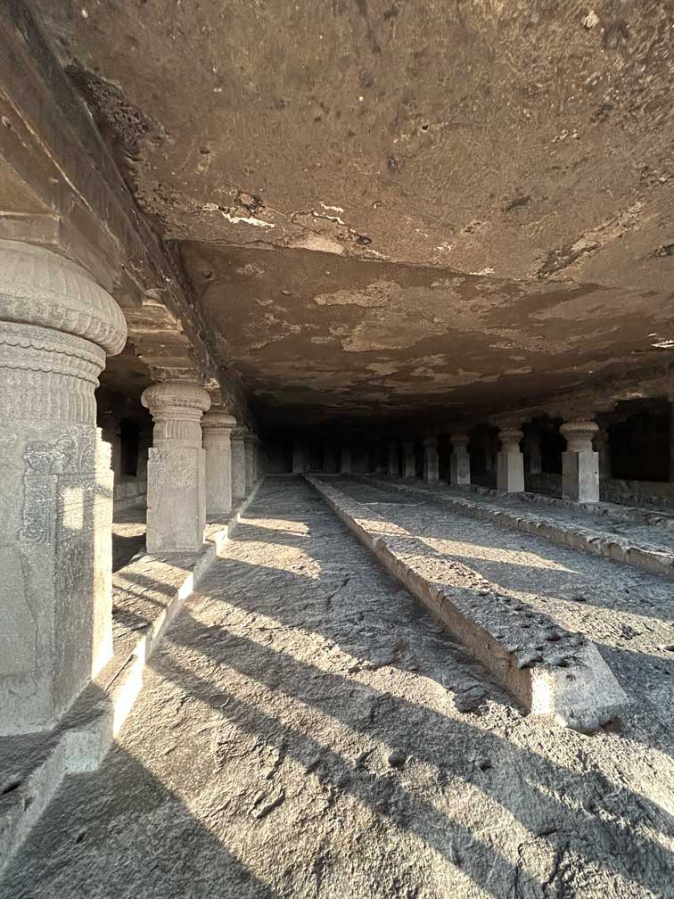 Interior of Buddha Viharas showing pillars and carved ceiling at Ellora caves