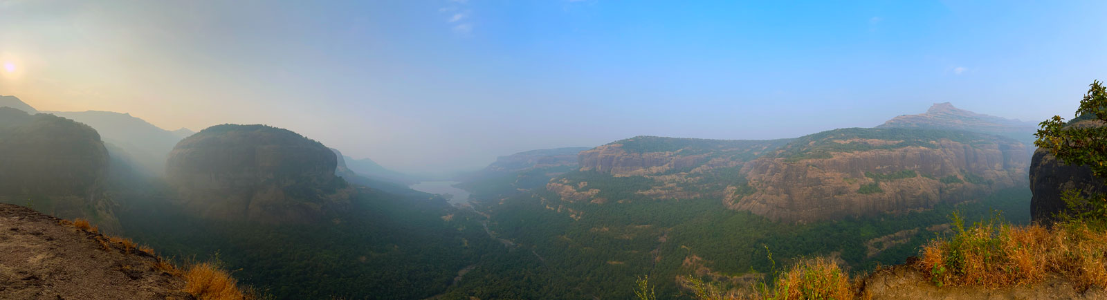 Panoramic view of Sahyadri valleys from Savlya Ghat plateau with Kundalika River and surrounding mountains